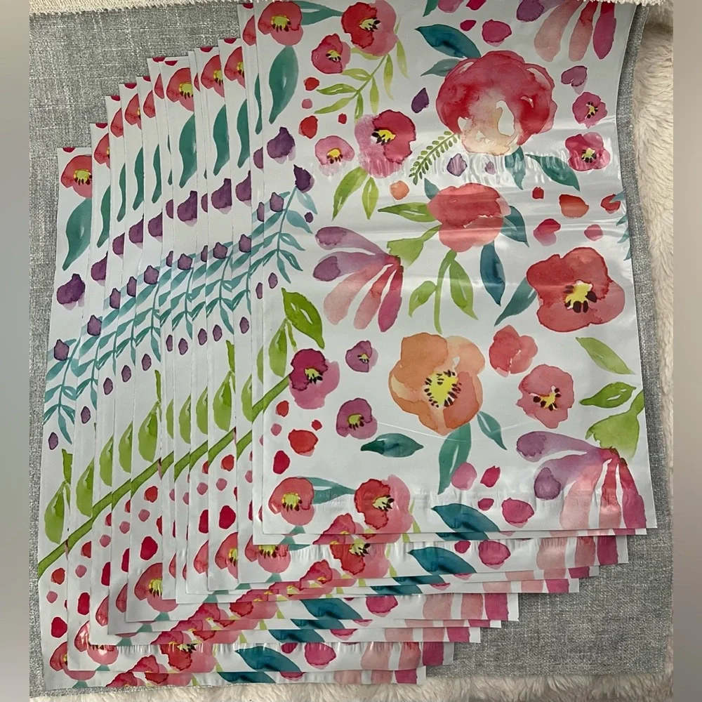 Floral & Teal Poly Mailers 10 each-20 total.Floral is 10”x13” Teal is 19”x 14.75